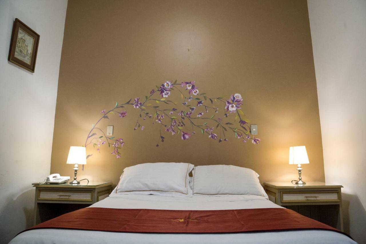 Hotel La Orquidea Cuenca Rom bilde